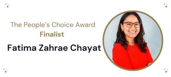 A white banner with a circular image of a smiling woman on the right hand side. To the left in gold writing it reads’ The People’s Choice Award Finalist’ under which it reads ‘Fatima Zahrae Chayat’’ in navy text